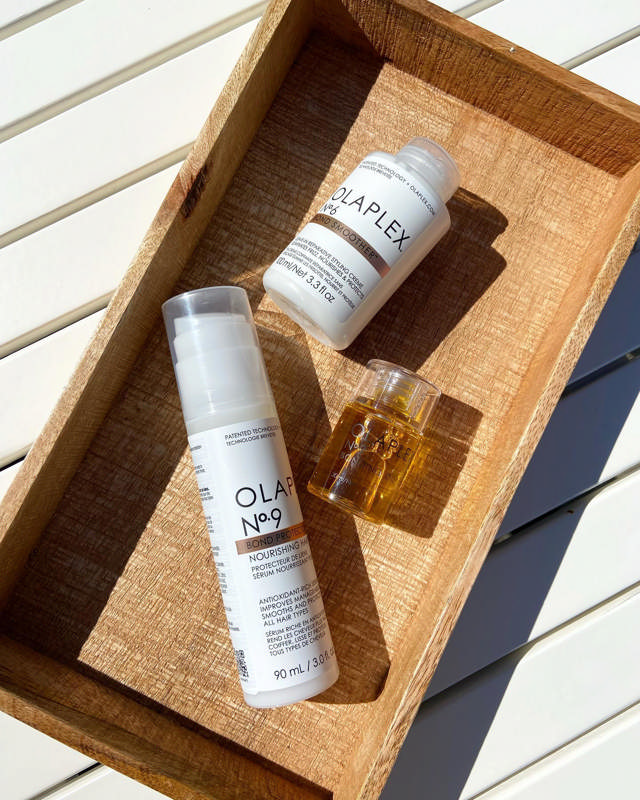 Olaplex No. 9 og No. 8 produkter – nærende hårserum og fugtgivende hårmaske fra Olaplex, perfekt til genopbygning og beskyttelse af håret.